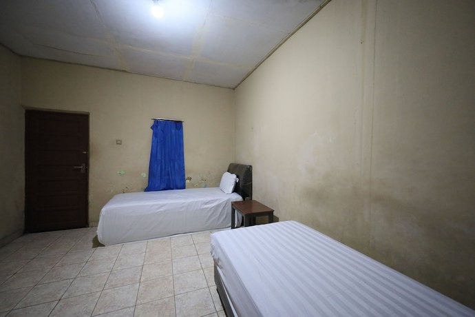 Imagen de la habitación del Hotel Oyo 93343 Sukma Residence. Foto 7