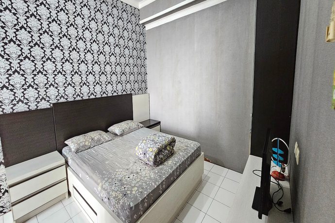 Imagen de la habitación del Hotel Oyo 93352 Apartement Gateway Cicadas By Db Rent. Foto 4