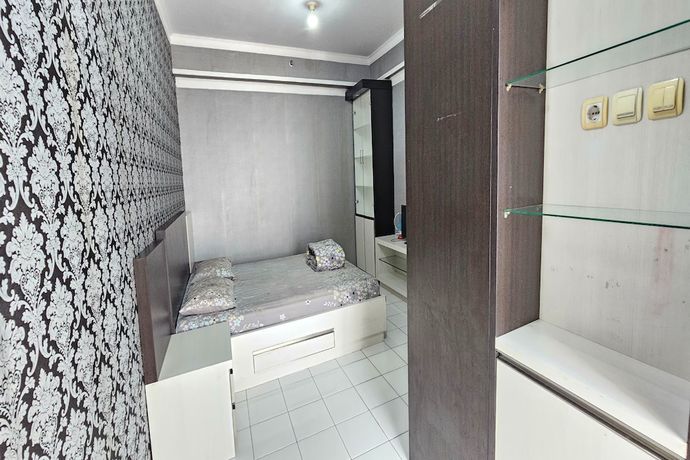 Imagen de la habitación del Hotel Oyo 93352 Apartement Gateway Cicadas By Db Rent. Foto 9