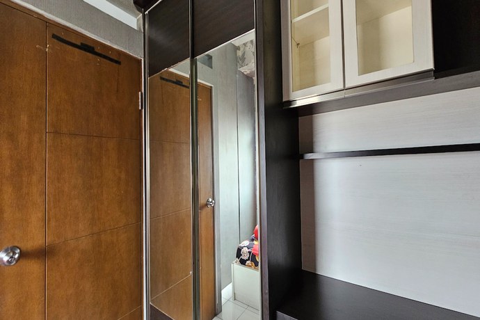 Imagen de la habitación del Hotel Oyo 93352 Apartement Gateway Cicadas By Db Rent. Foto 10