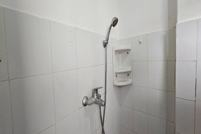 Imagen de la habitación del Hotel Oyo 93352 Apartement Gateway Cicadas By Db Rent. Foto 13