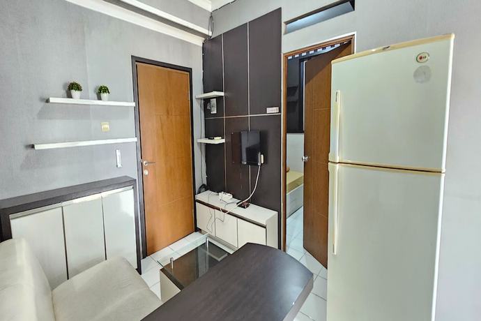Imagen de la habitación del Hotel Oyo 93352 Apartement Gateway Cicadas By Db Rent. Foto 14