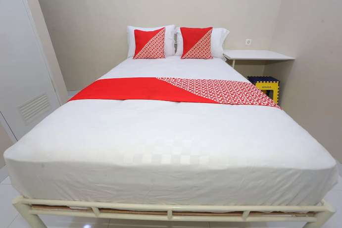Imagen de la habitación del Hotel Oyo 93356 Pondok Cirendeu. Foto 2