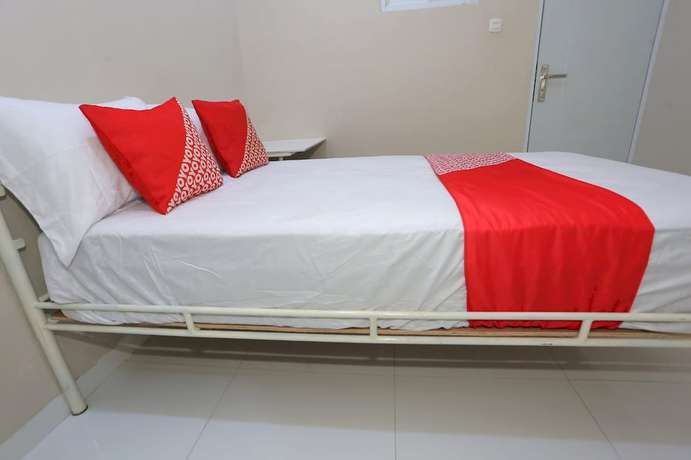 Imagen de la habitación del Hotel Oyo 93356 Pondok Cirendeu. Foto 3