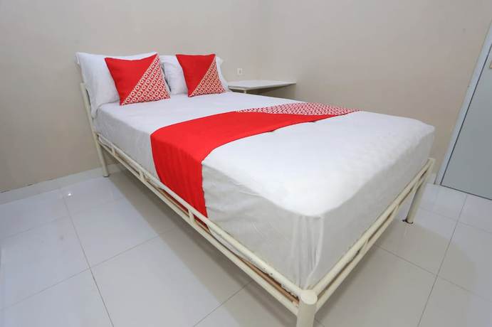 Imagen de la habitación del Hotel Oyo 93356 Pondok Cirendeu. Foto 5