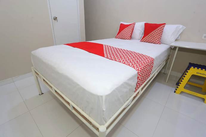 Imagen de la habitación del Hotel Oyo 93356 Pondok Cirendeu. Foto 8