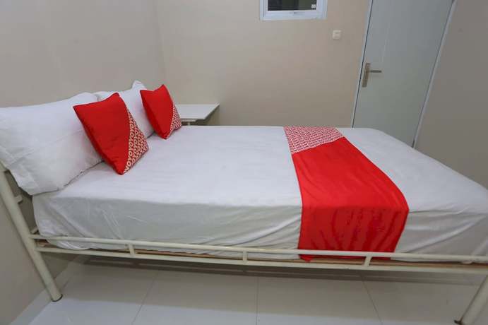 Imagen de la habitación del Hotel Oyo 93356 Pondok Cirendeu. Foto 11