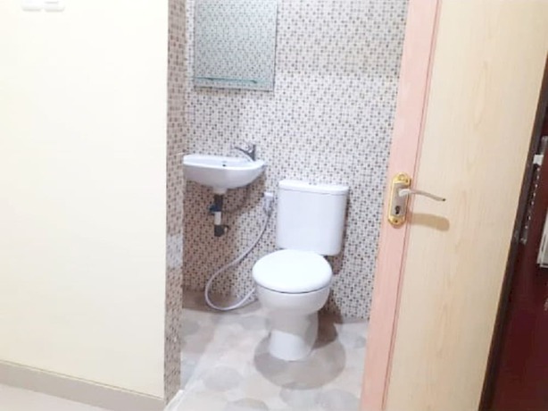 Imagen de la habitación del Hotel Oyo 93356 Pondok Cirendeu. Foto 13