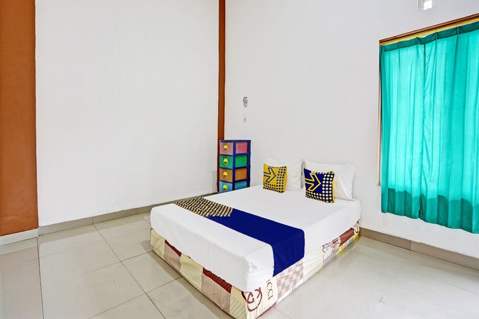 Imagen de la habitación del Hotel Oyo 93360 Wisma Subur Syariah. Foto 3