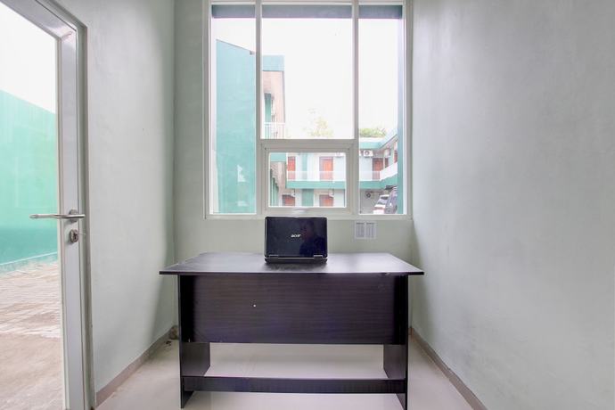 Imagen de los interiores del Hotel Oyo 93360 Wisma Subur Syariah. Foto 16