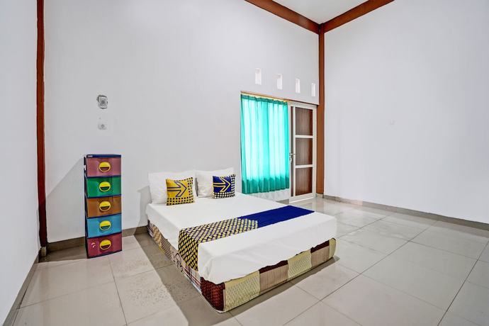 Imagen de la habitación del Hotel Oyo 93360 Wisma Subur Syariah. Foto 7