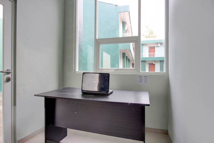 Imagen de los interiores del Hotel Oyo 93360 Wisma Subur Syariah. Foto 18