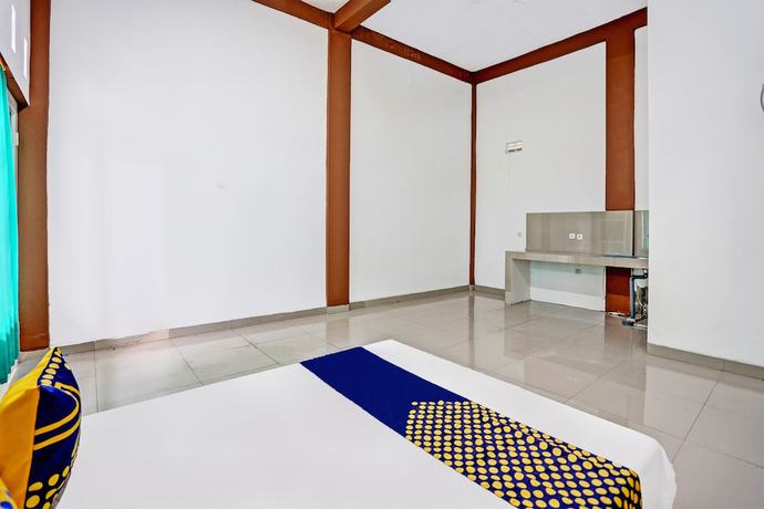 Imagen de la habitación del Hotel Oyo 93360 Wisma Subur Syariah. Foto 8