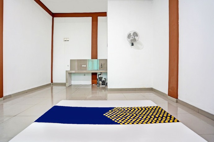 Imagen de la habitación del Hotel Oyo 93360 Wisma Subur Syariah. Foto 9