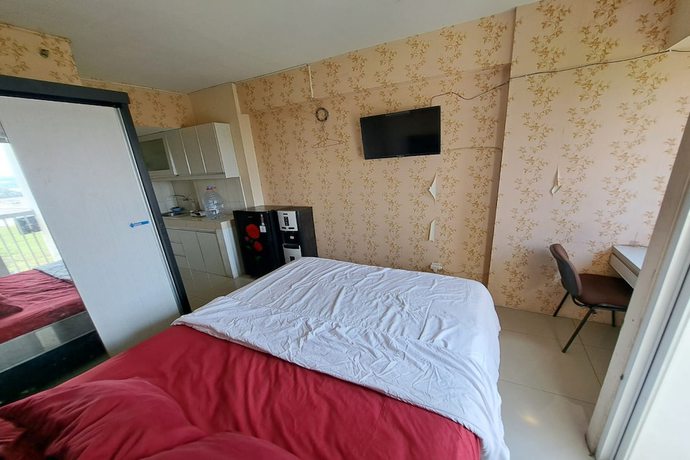 Imagen de la habitación del Hotel Oyo 93364 Apartement Grand Sentraland By King Property. Foto 4