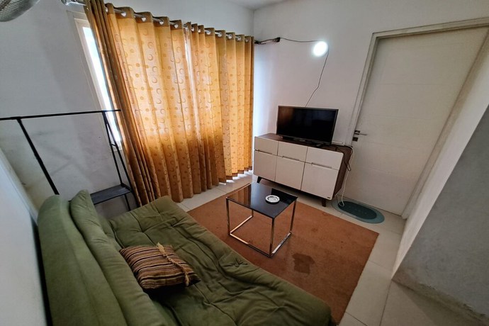 Imagen de la habitación del Hotel Oyo 93364 Apartement Grand Sentraland By King Property. Foto 5