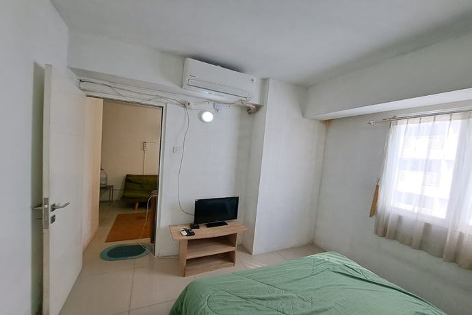 Imagen de la habitación del Hotel Oyo 93364 Apartement Grand Sentraland By King Property. Foto 9