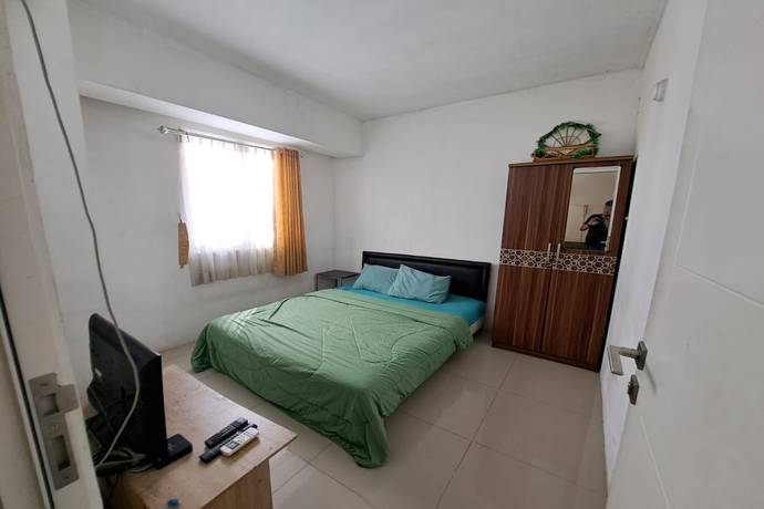 Imagen de la habitación del Hotel Oyo 93364 Apartement Grand Sentraland By King Property. Foto 11