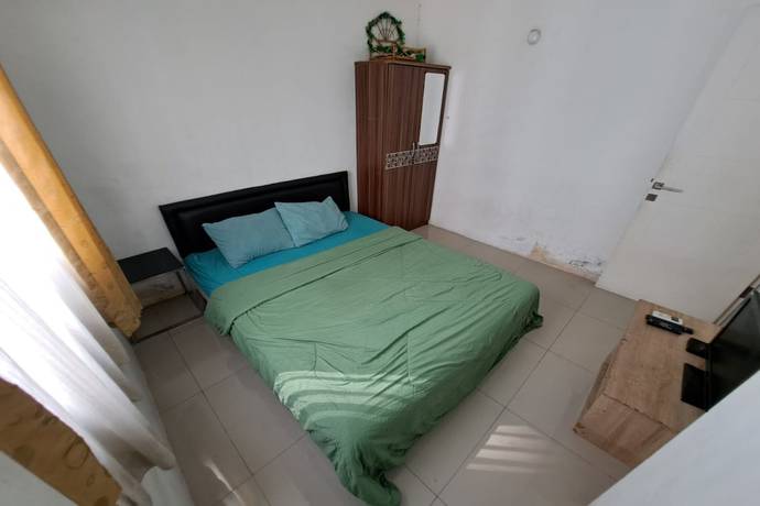 Imagen de la habitación del Hotel Oyo 93364 Apartement Grand Sentraland By King Property. Foto 12