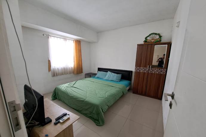 Imagen de la habitación del Hotel Oyo 93366 Apartement Grand Sentraland By Rai Property. Foto 10