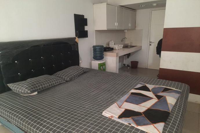 Imagen de la habitación del Hotel Oyo 93366 Apartement Grand Sentraland By Rai Property. Foto 13