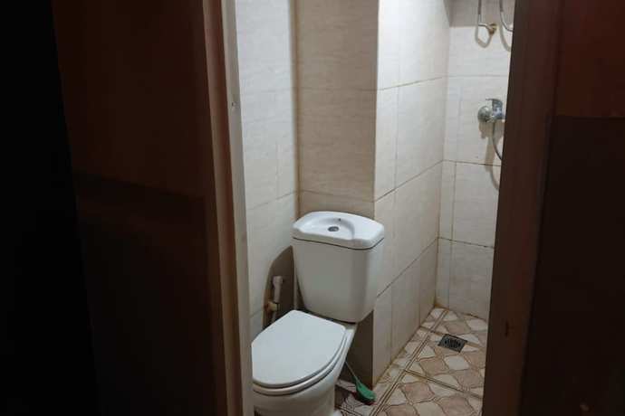 Imagen de la habitación del Hotel Oyo 93386 Apartemen Grand Sentraland By Mira. Foto 9
