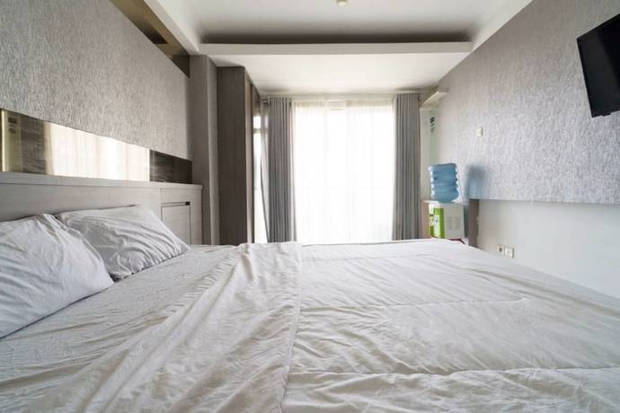 Imagen de la habitación del Hotel Oyo 93424 Apartemen The Suite Metro By Salman. Foto 5