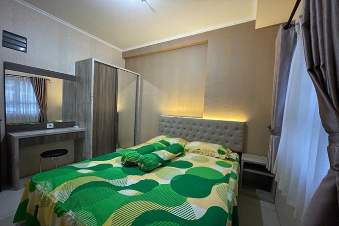 Imagen de la habitación del Hotel Oyo 93424 Apartemen The Suite Metro By Salman. Foto 8
