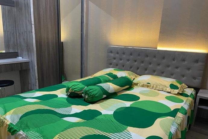 Imagen de la habitación del Hotel Oyo 93424 Apartemen The Suite Metro By Salman. Foto 9