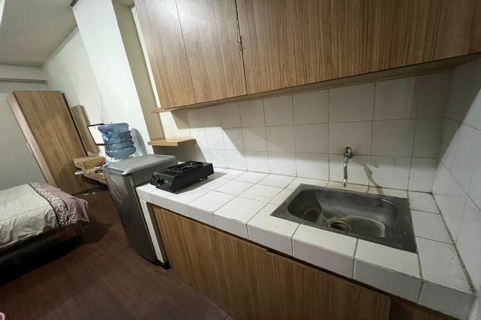 Imagen de la habitación del Hotel Oyo 93424 Apartemen The Suite Metro By Salman. Foto 16