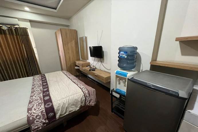 Imagen de la habitación del Hotel Oyo 93424 Apartemen The Suite Metro By Salman. Foto 17