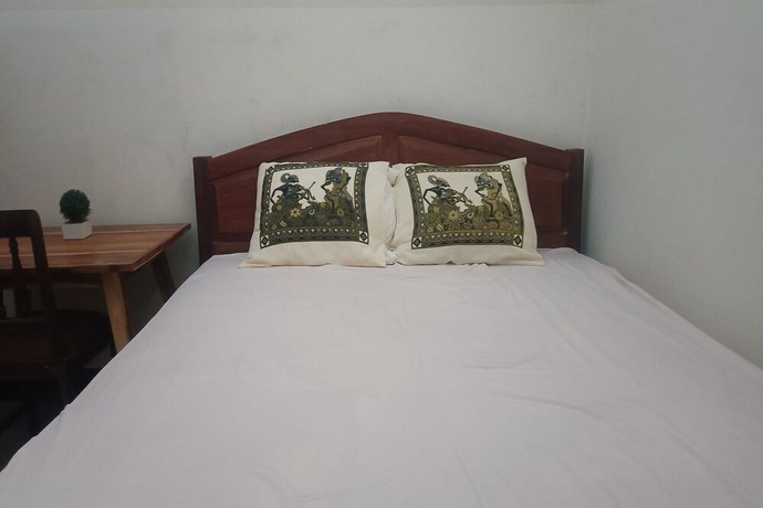 Imagen de la habitación del Hotel Oyo 93425 Homestay Anisa. Foto 8