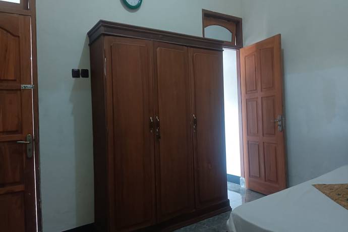 Imagen de la habitación del Hotel Oyo 93425 Homestay Anisa. Foto 13