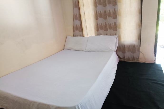 Imagen de la habitación del Hotel Oyo 93435 Yuda Family Homestay. Foto 10