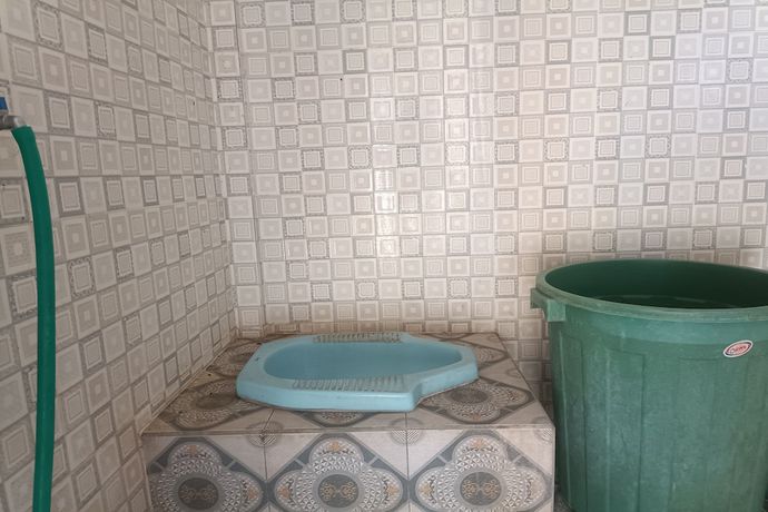 Imagen de la habitación del Hotel Oyo 93435 Yuda Family Homestay. Foto 11