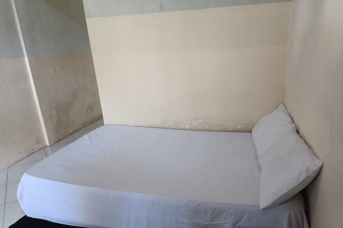 Imagen de la habitación del Hotel Oyo 93435 Yuda Family Homestay. Foto 14