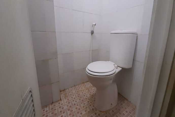 Imagen de la habitación del Hotel Oyo 93439 The Suites Metro By Interindo. Foto 15