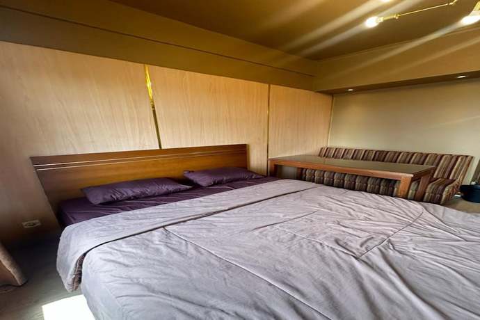 Imagen de la habitación del Hotel Oyo 93492 Mamiya Rooms. Foto 4