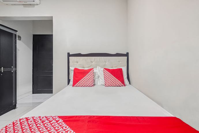 Imagen de la habitación del Hotel Oyo 93500 Rizki Residence By Tos. Foto 8
