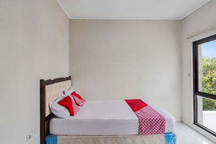 Imagen de la habitación del Hotel Oyo 93500 Rizki Residence By Tos. Foto 9