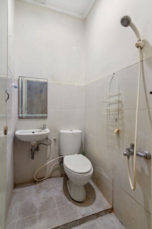 Imagen de la habitación del Hotel Oyo 93500 Rizki Residence By Tos. Foto 10