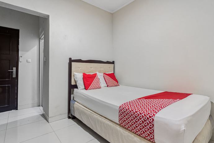 Imagen de la habitación del Hotel Oyo 93500 Rizki Residence By Tos. Foto 12