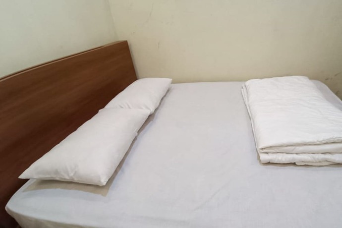 Imagen de la habitación del Hotel Oyo 93518 Kepayang Guesthouse Syariah. Foto 1
