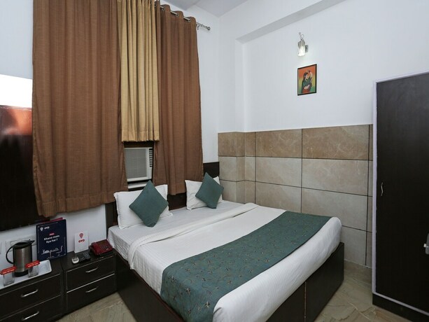 Imagen de la habitación del Hotel Oyo 9367 Taj Galaxy. Foto 10