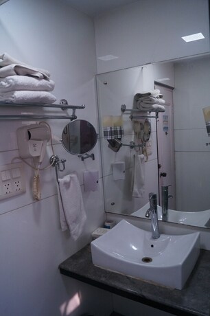 Imagen de la habitación del Hotel Oyo 9580 Garnet Inn. Foto 5