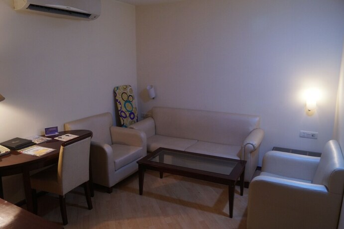 Imagen de la habitación del Hotel Oyo 9580 Garnet Inn. Foto 11