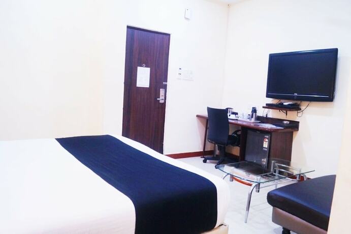 Imagen de la habitación del Hotel Oyo 9580 Garnet Inn. Foto 18