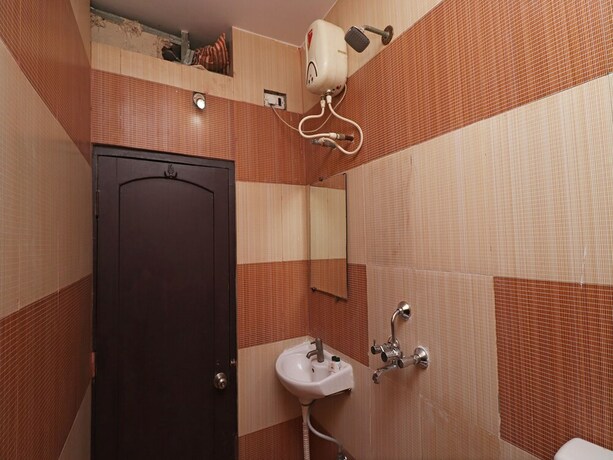 Imagen de la habitación del Hotel Oyo 9580 Garnet Inn. Foto 27
