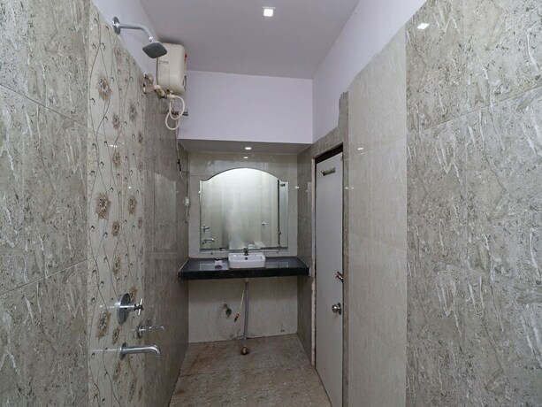 Imagen de la habitación del Hotel Oyo 9580 Garnet Inn. Foto 29