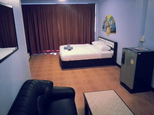 Imagen de la habitación del Hotel Oyo 963 Sunshine Guesthouse. Foto 3